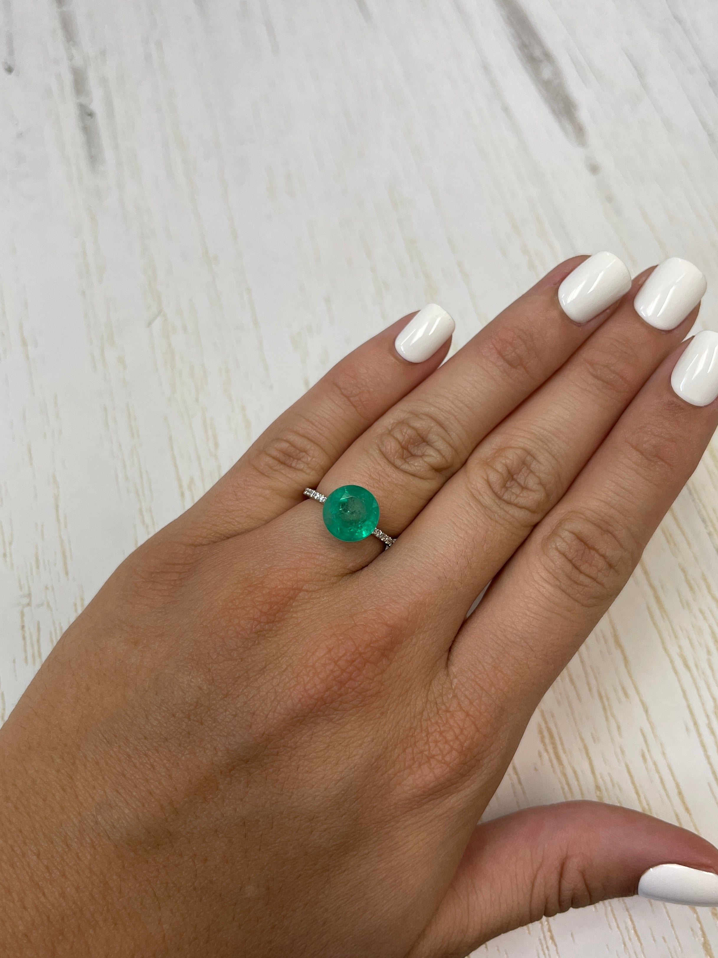 Medium green 4.42 carat round natural Colombian emerald loose gemstone from JR Colombian Emeralds.
