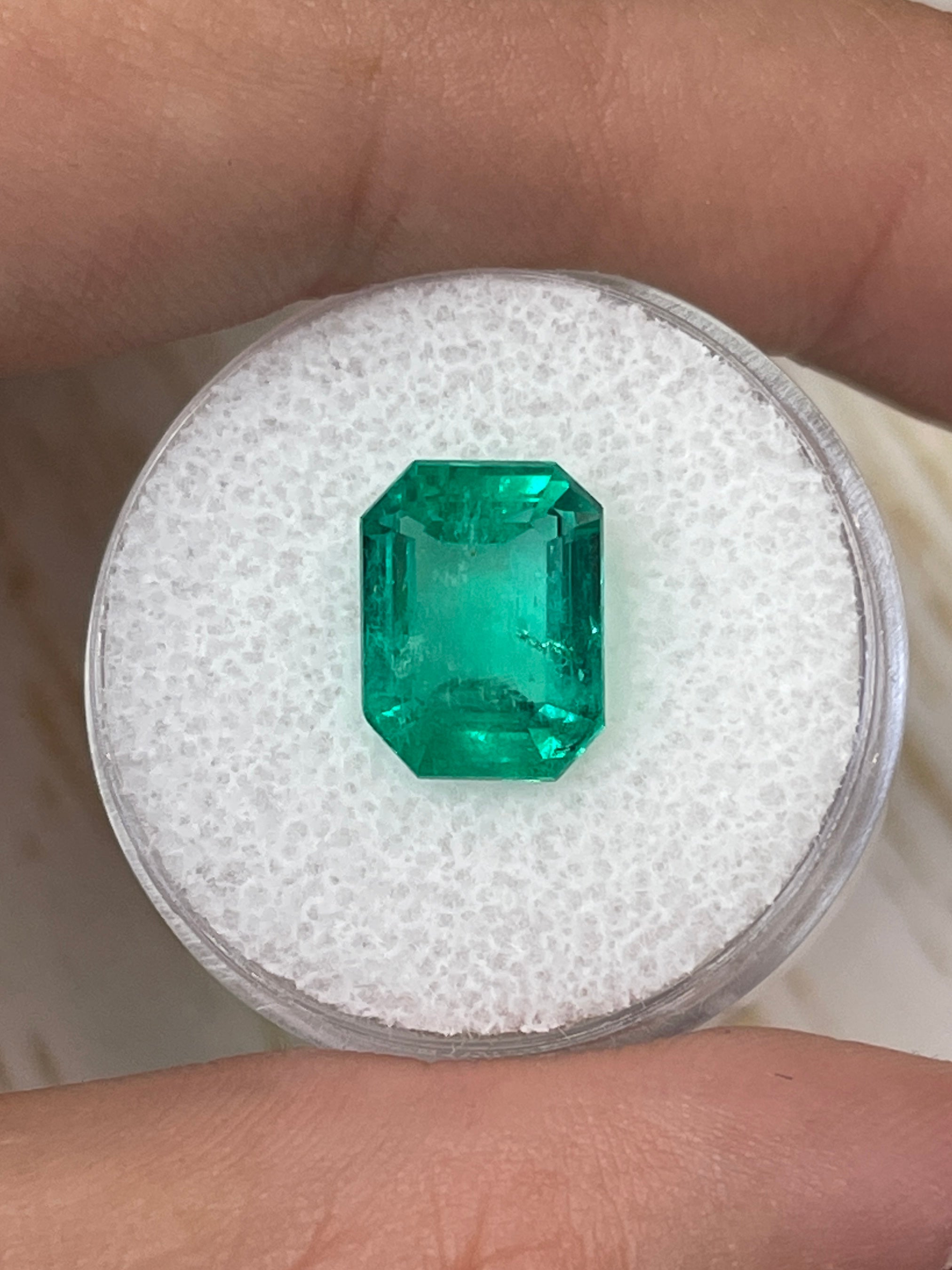 Natural loose Colombian emerald, 4.64 carats, 11x9mm, vibrant bluish-green, emerald cut, from JR Colombian Emeralds.