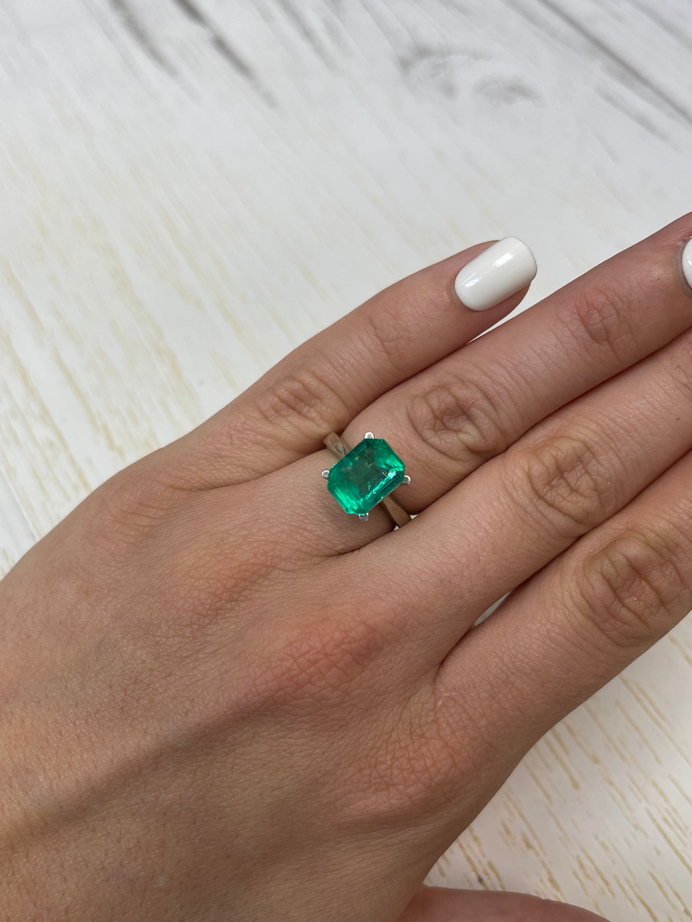 Natural loose Colombian emerald, 4.64 carats, 11x9 mm, vibrant bluish-green, emerald cut, from JR Colombian Emeralds.