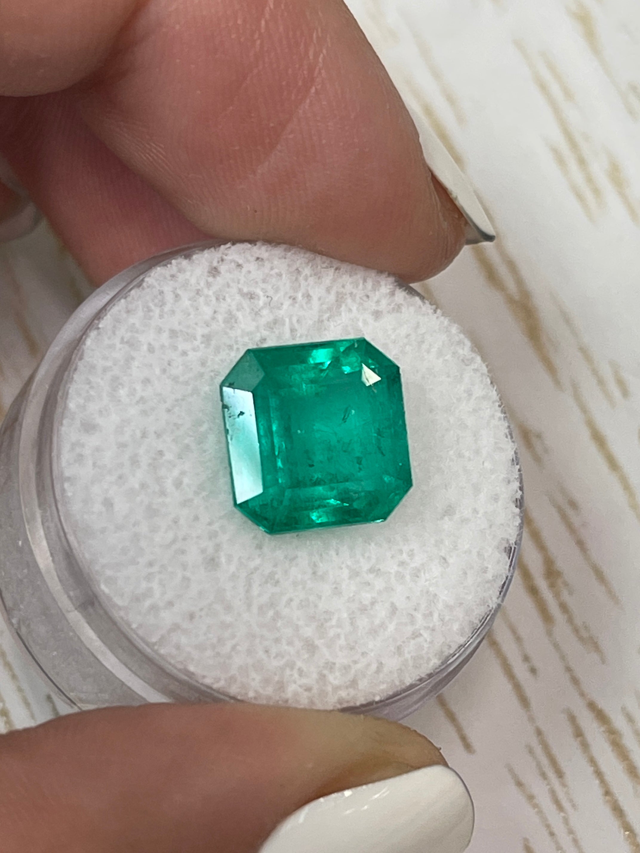 Deep bluish green 4.75 carat Colombian emerald loose stone in Asscher cut, natural with minor oil inclusions, from JR Colombian Emeralds.