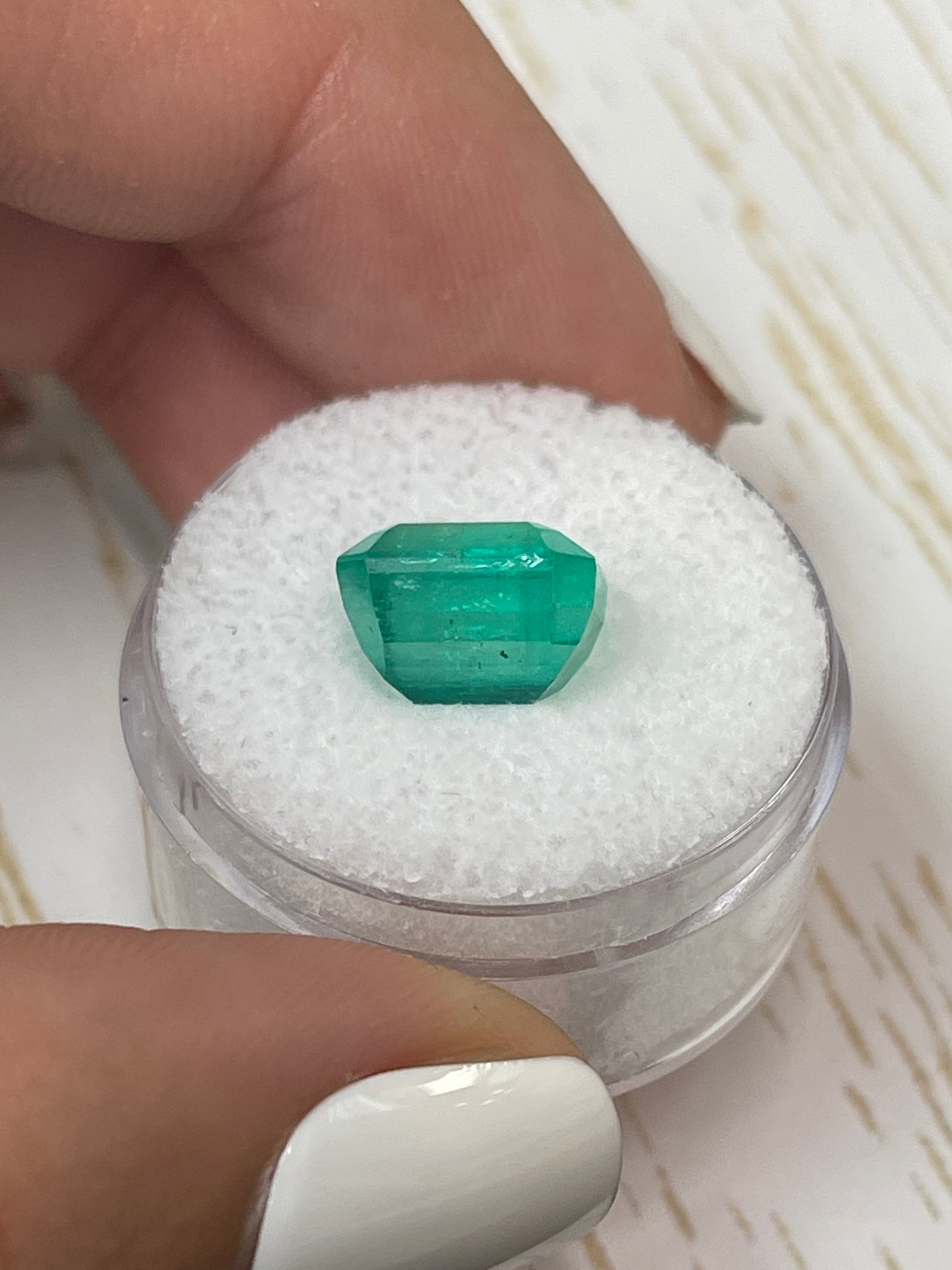 5.11-carat 10x8mm natural green Colombian emerald loose gemstone in an emerald cut by JR Colombian Emeralds