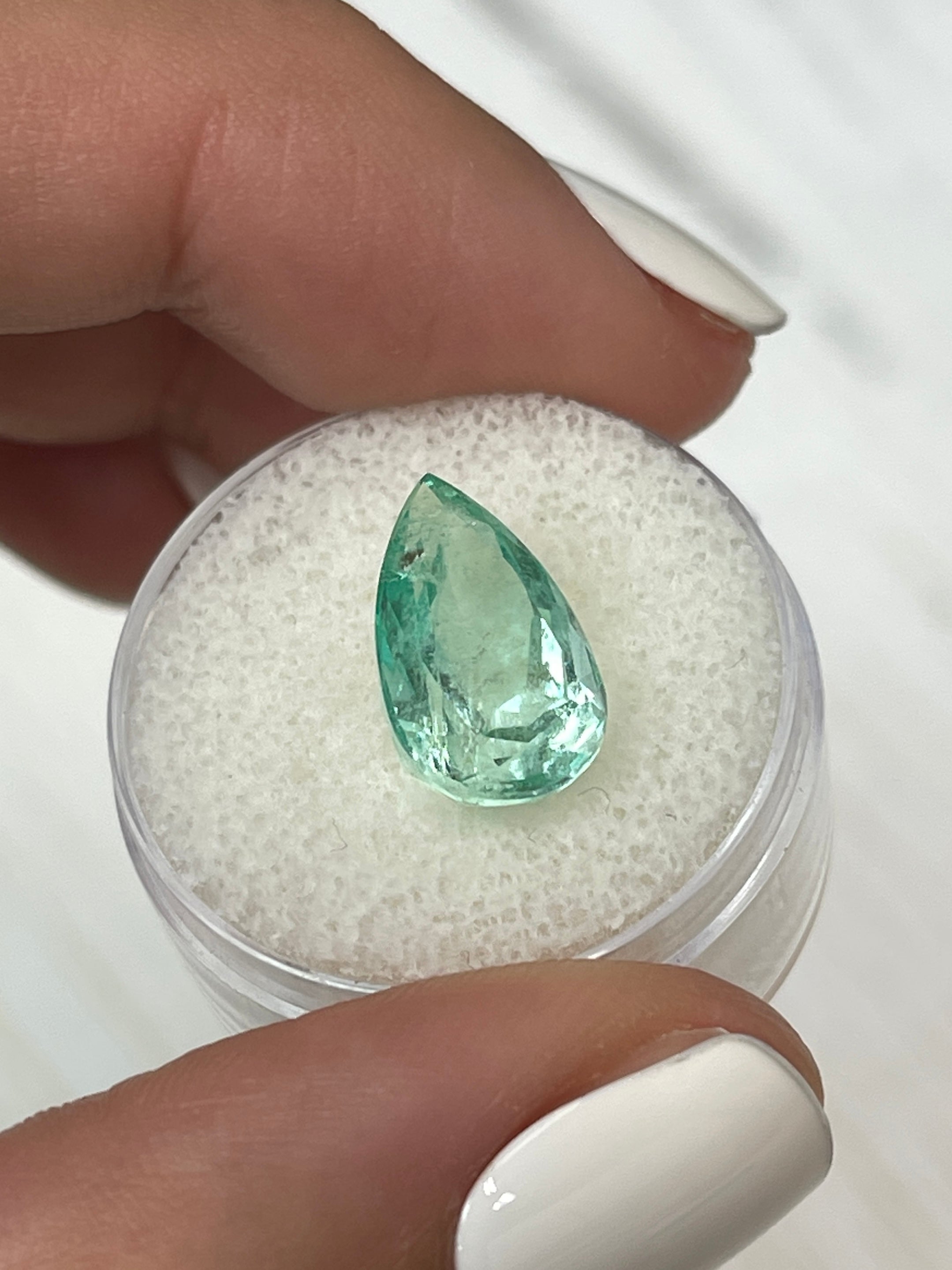 Natural light green Colombian emerald loose gemstone, 5.57 carats, pear cut, from JR Colombian Emeralds.