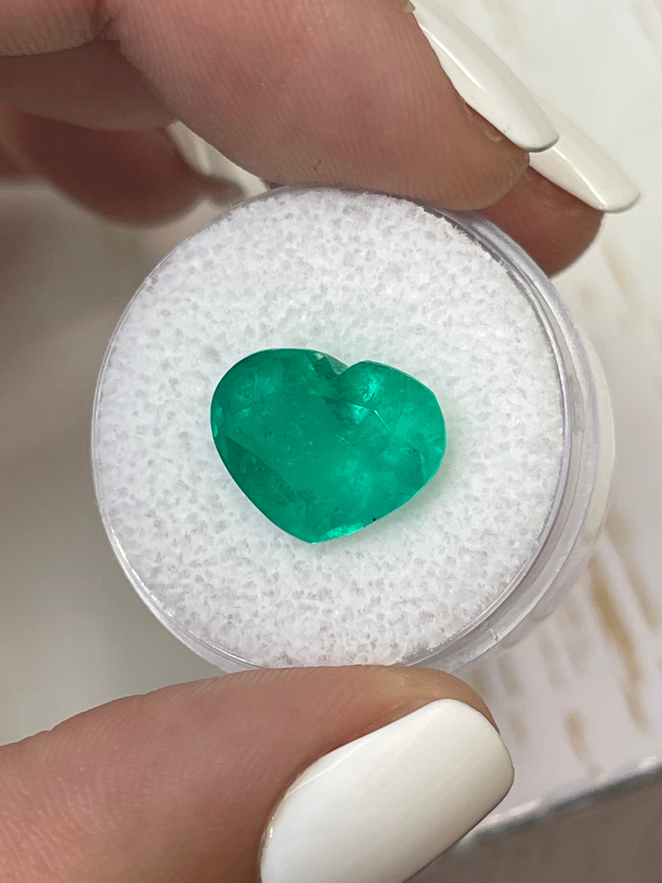 Bright green 5.80 carat natural Colombian emerald, heart cut, loose gemstone by JR Colombian Emeralds.