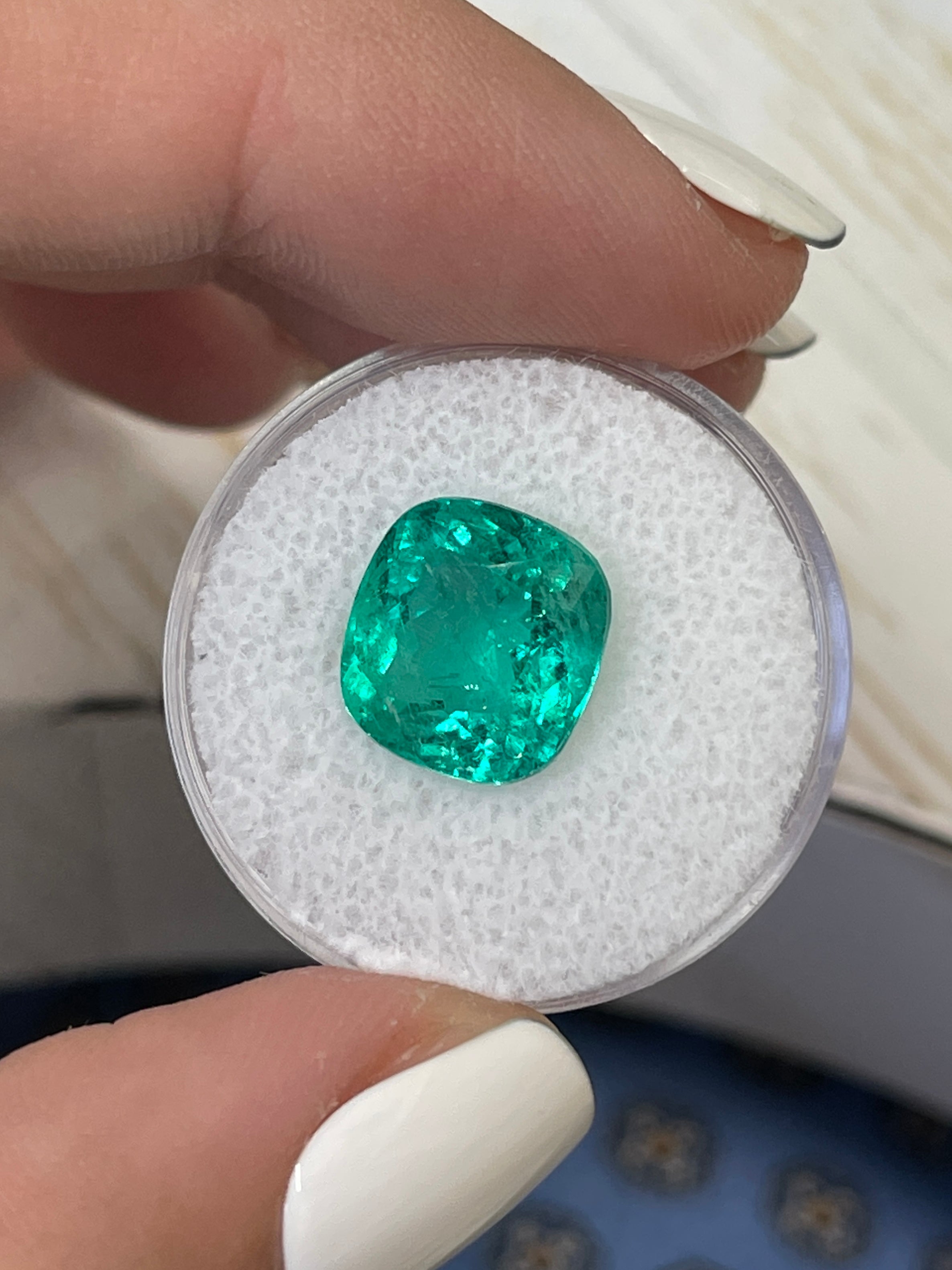 Natural 11.5x10.8 mm bluish green Colombian emerald in cushion cut, certified 5.80 carat loose gemstone from JR Colombian Emeralds.