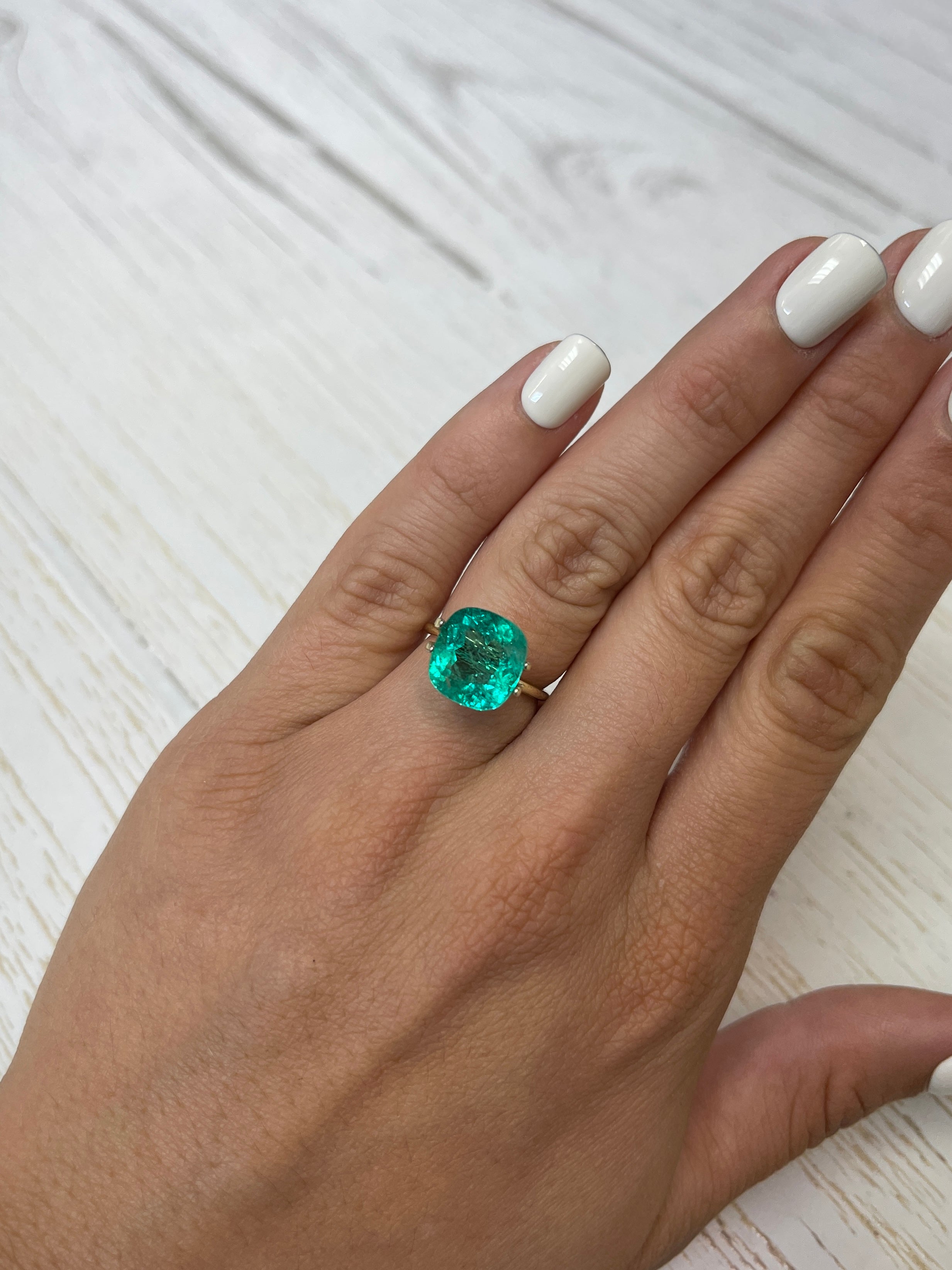 Natural bluish green Colombian emerald, 5.80 carats, cushion cut, loose gemstone from JR Colombian Emeralds.