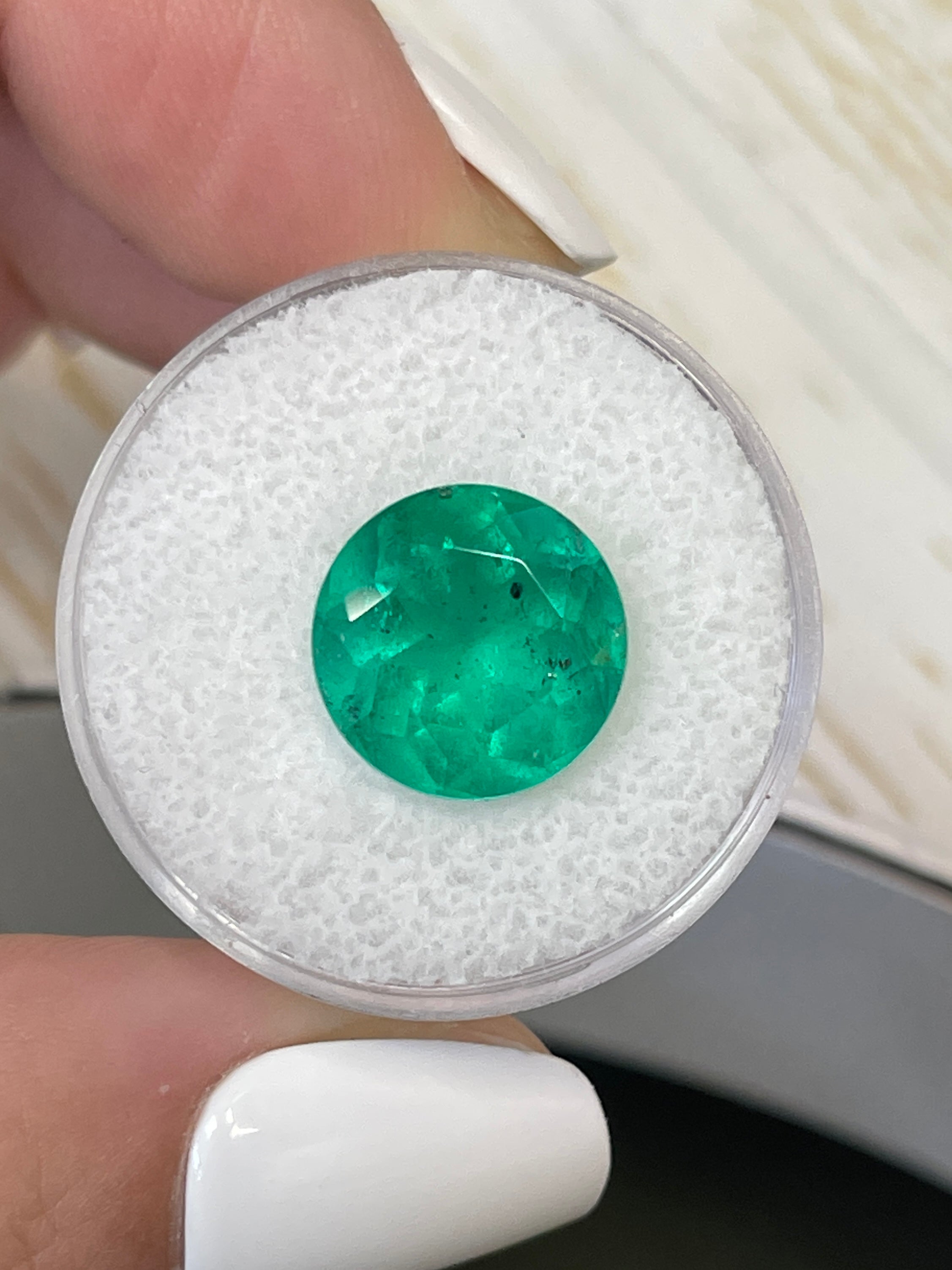 6.16 carat natural Colombian emerald, round cut with freckles, loose gemstone, vibrant green color from JR Colombian Emeralds