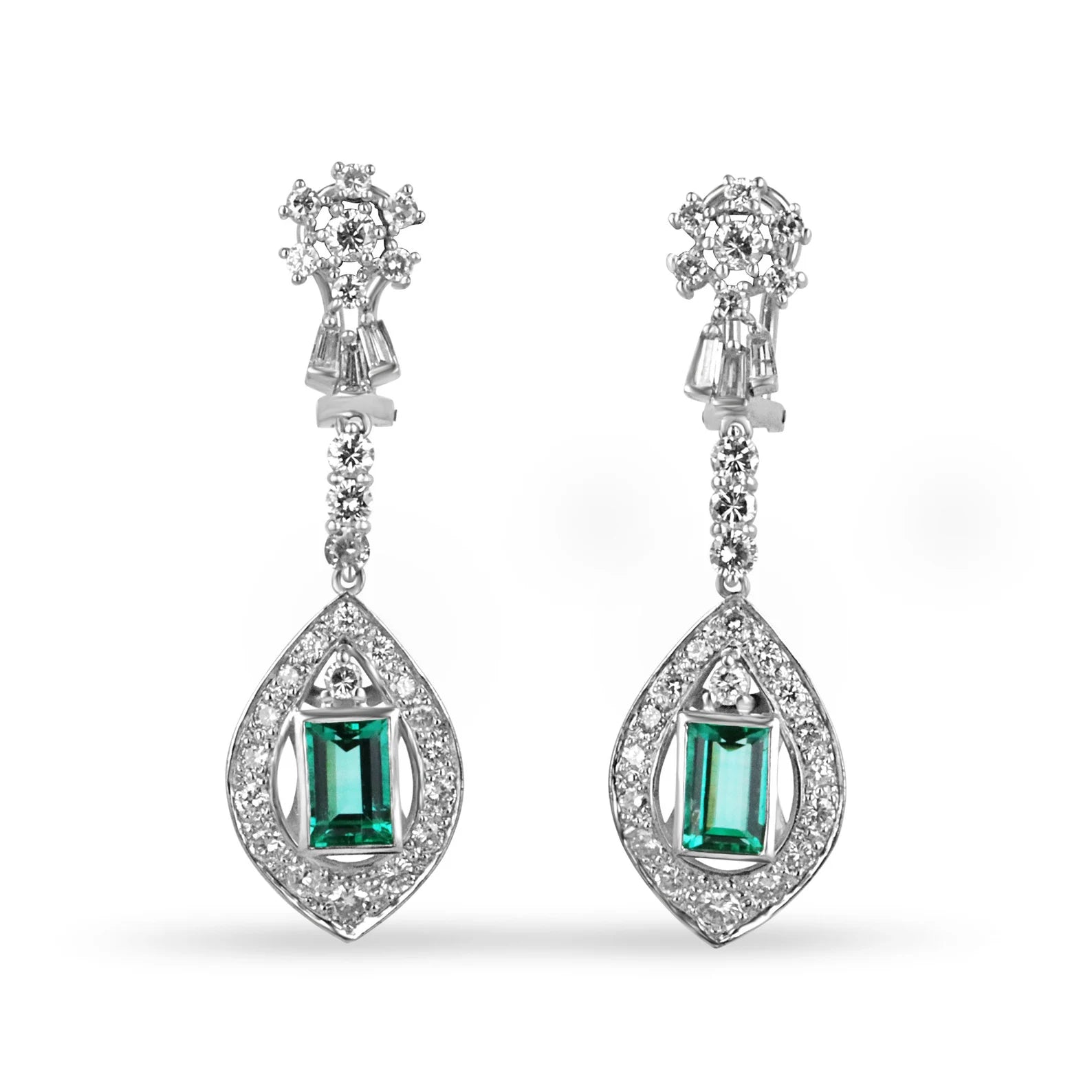 Art Deco Colombian emerald and diamond dangle earrings in 18K gold with intricate design and sparkling gemstones.