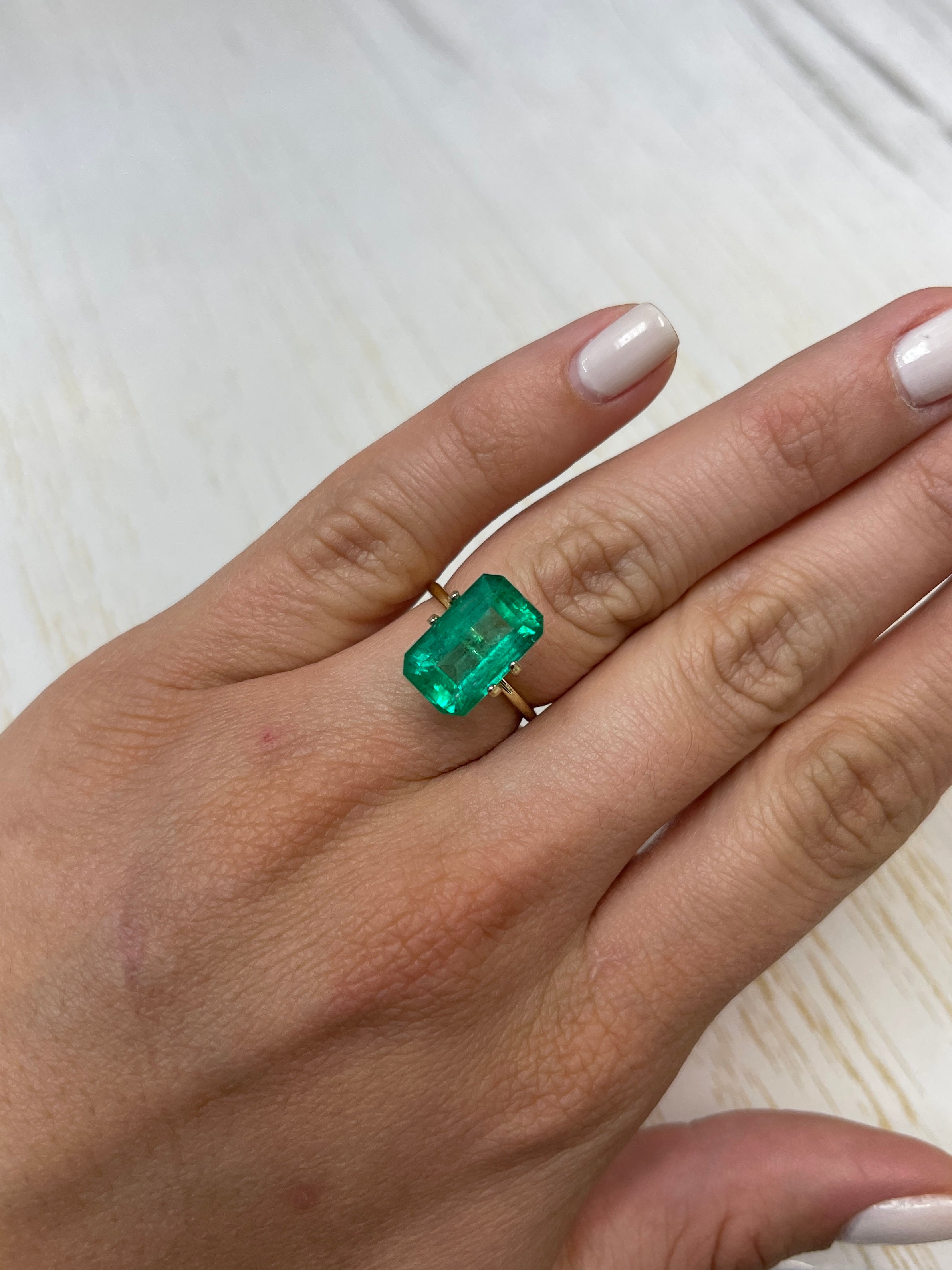 Six 14x9 mm bluish-green Colombian emerald cut loose emerald gemstone, 6.22 carats, from JR Colombian Emeralds.