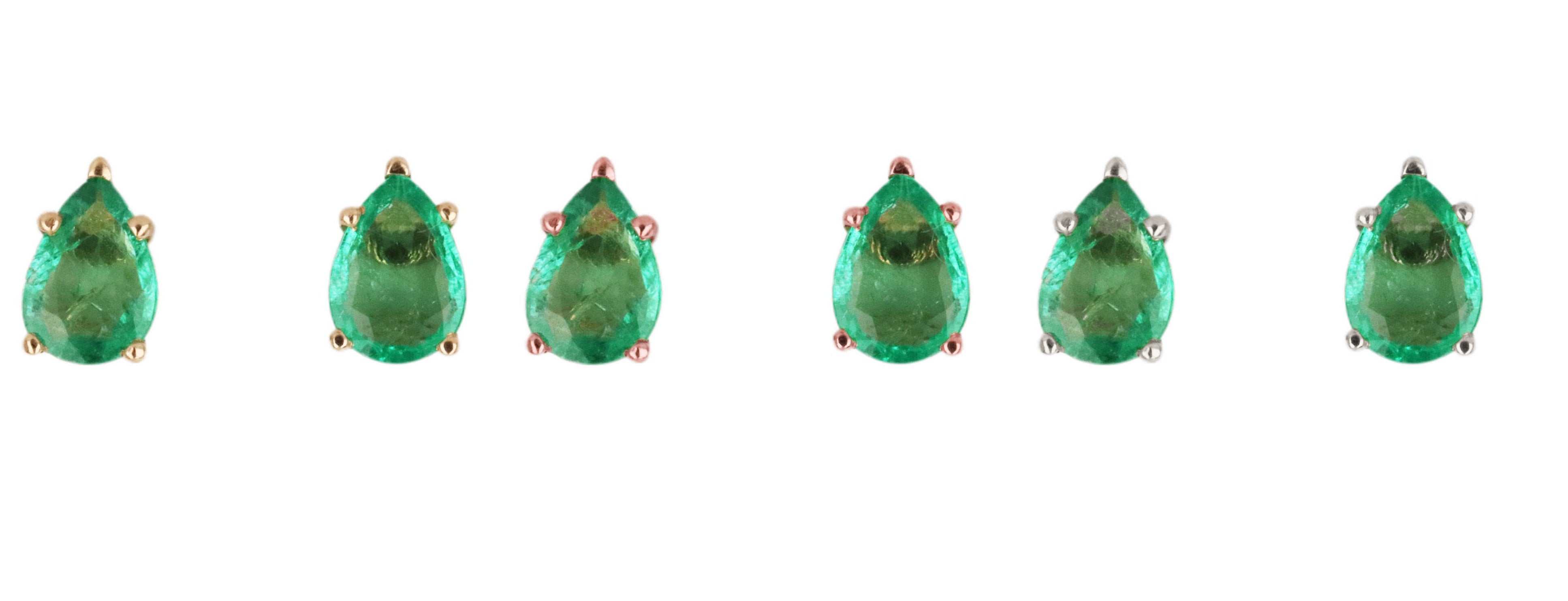 Natural pear cut emerald stud earrings in rich green, set in 14K gold, from JR Colombian Emeralds.