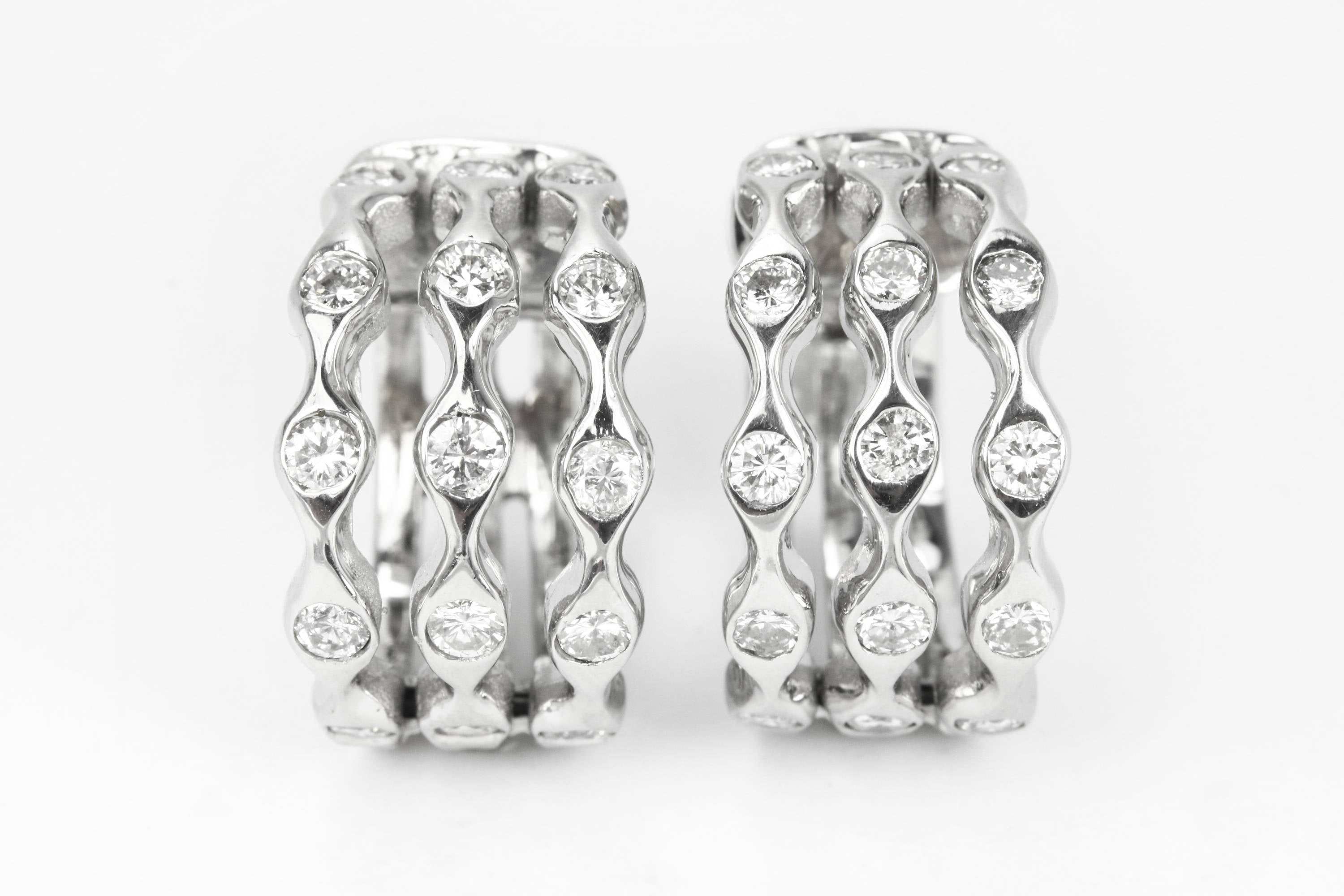 1.05tcw Modern White gold and diamond 14Ks Boucheron ring, "Richelieu" collection. 