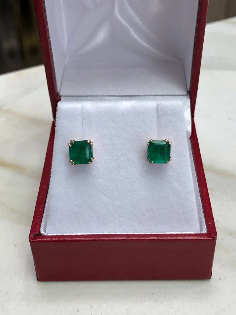 Rose gold double prong emerald earrings with natural green emeralds and 14K gold setting by JR Colombian Emeralds