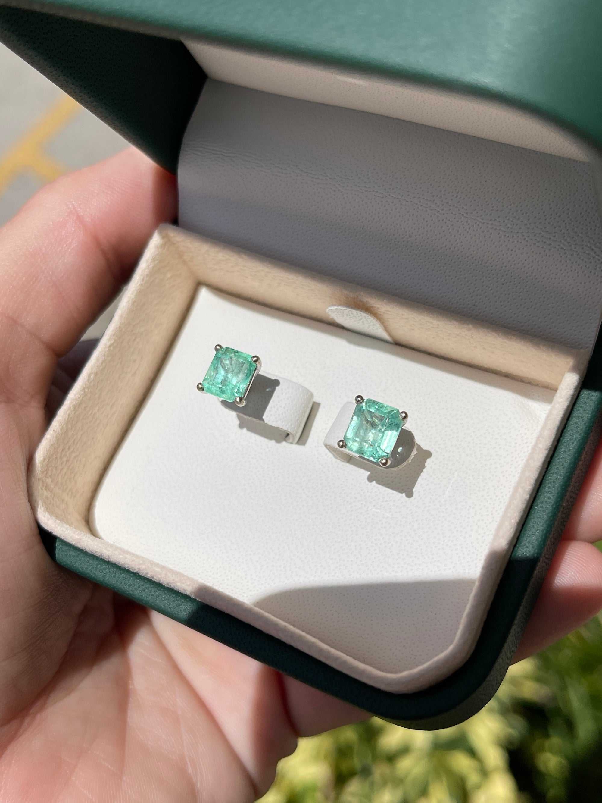 18K white gold Colombian emerald stud earrings with light green martini cut gemstones, totaling 3.46 carats, by JR Colombian Emeralds.