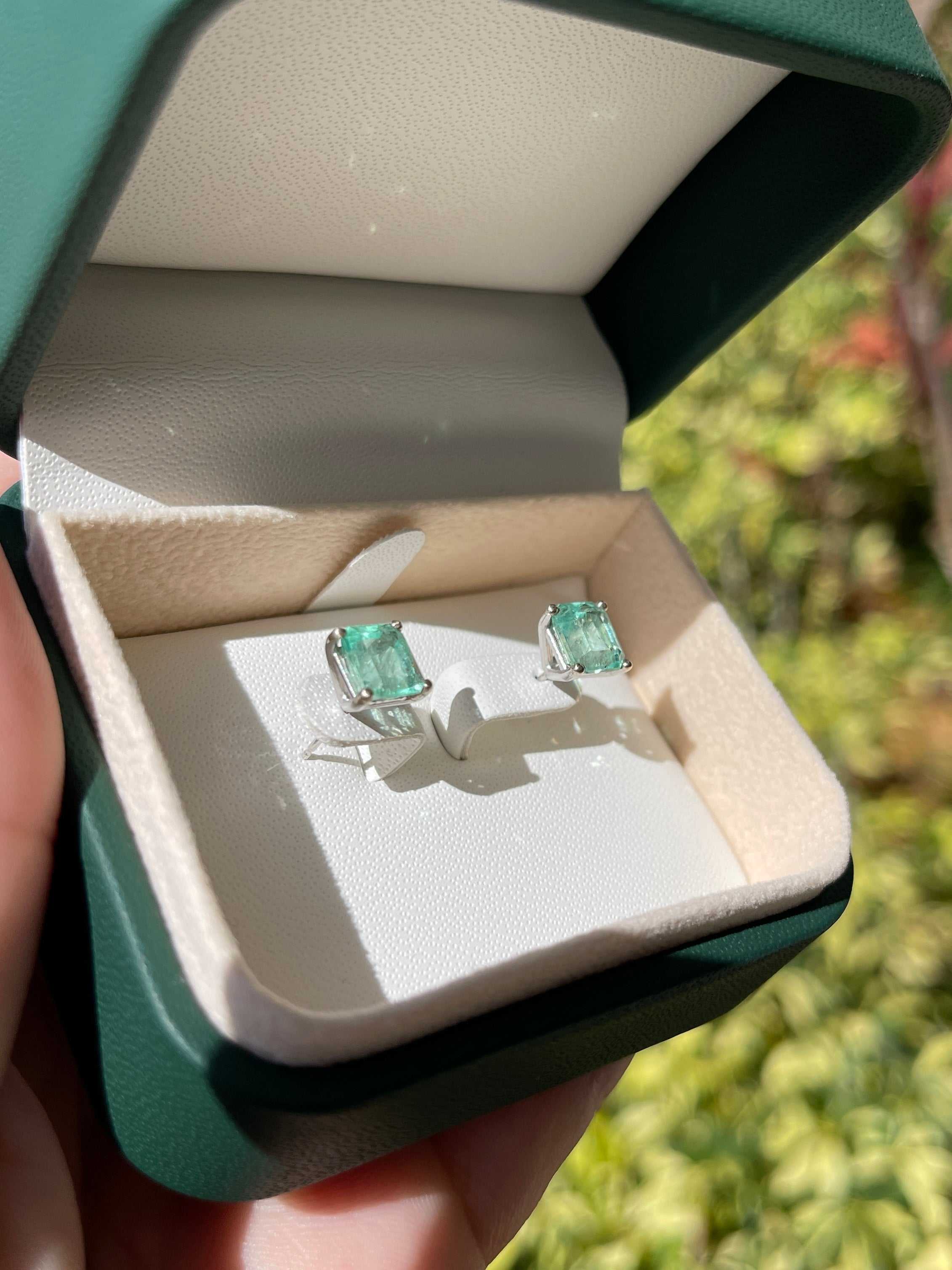 Light green Colombian emerald stud earrings in 18K white gold, featuring a 3.46tcw martini-cut design by JR Colombian Emeralds.