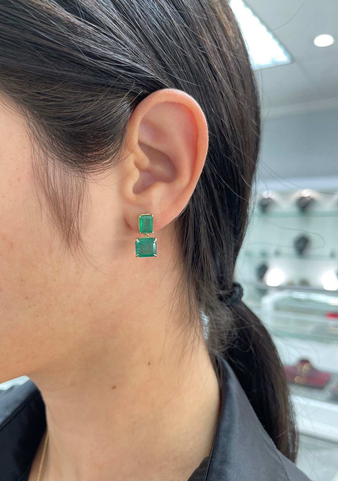 JR Colombian Emeralds 6.0tcw Natura emerald green dangle drop earrings in 14K gold, featuring vivid dark green emeralds.