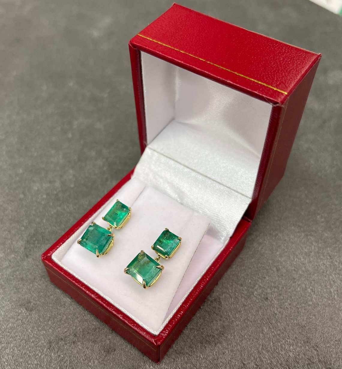 JR Colombian Emeralds 6.0 tcw Natura emerald green dangle drop earrings in 14K gold, featuring vivid dark green emeralds.