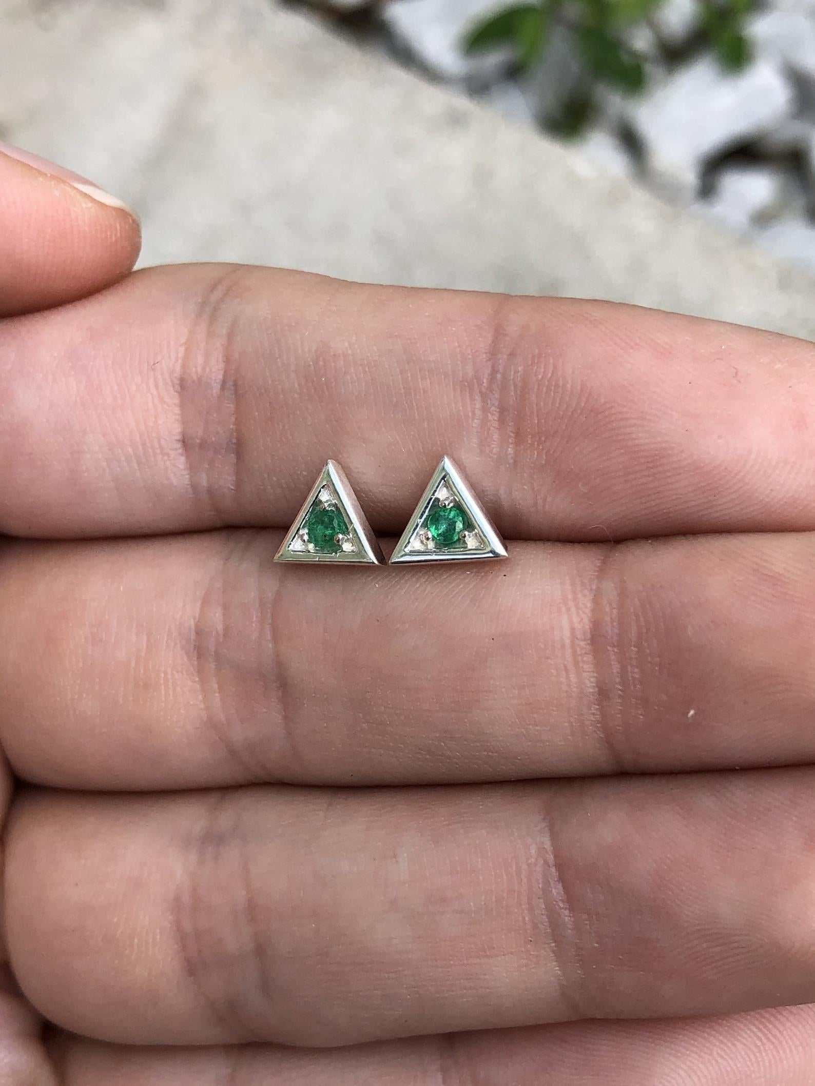 Silver earrings with triangle-shaped round emerald studs featuring brilliant cut gemstones by JR Colombian Emeralds.