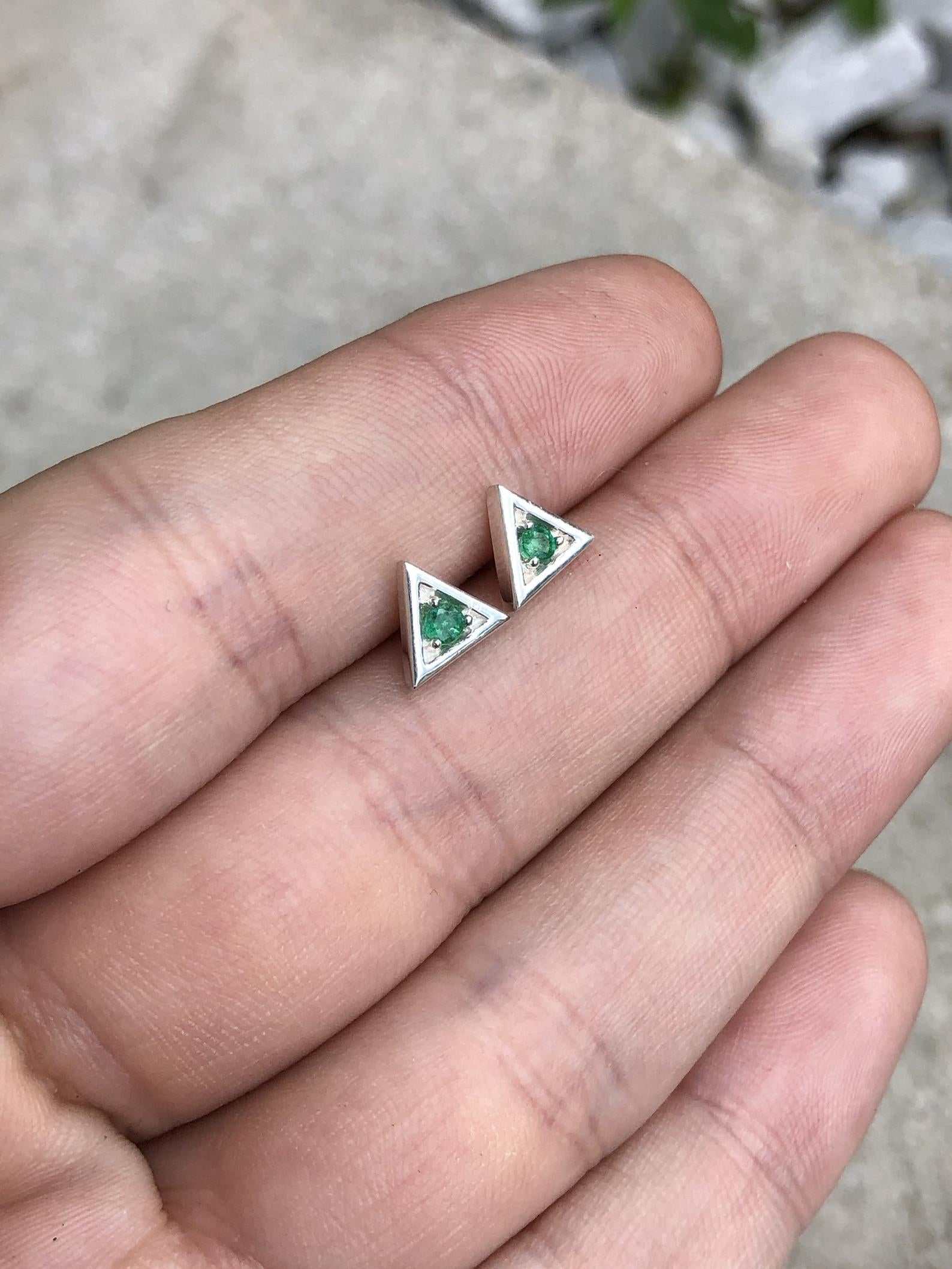 Silver earrings with round brilliant-cut emerald studs in triangle shape, by JR Colombian Emeralds.