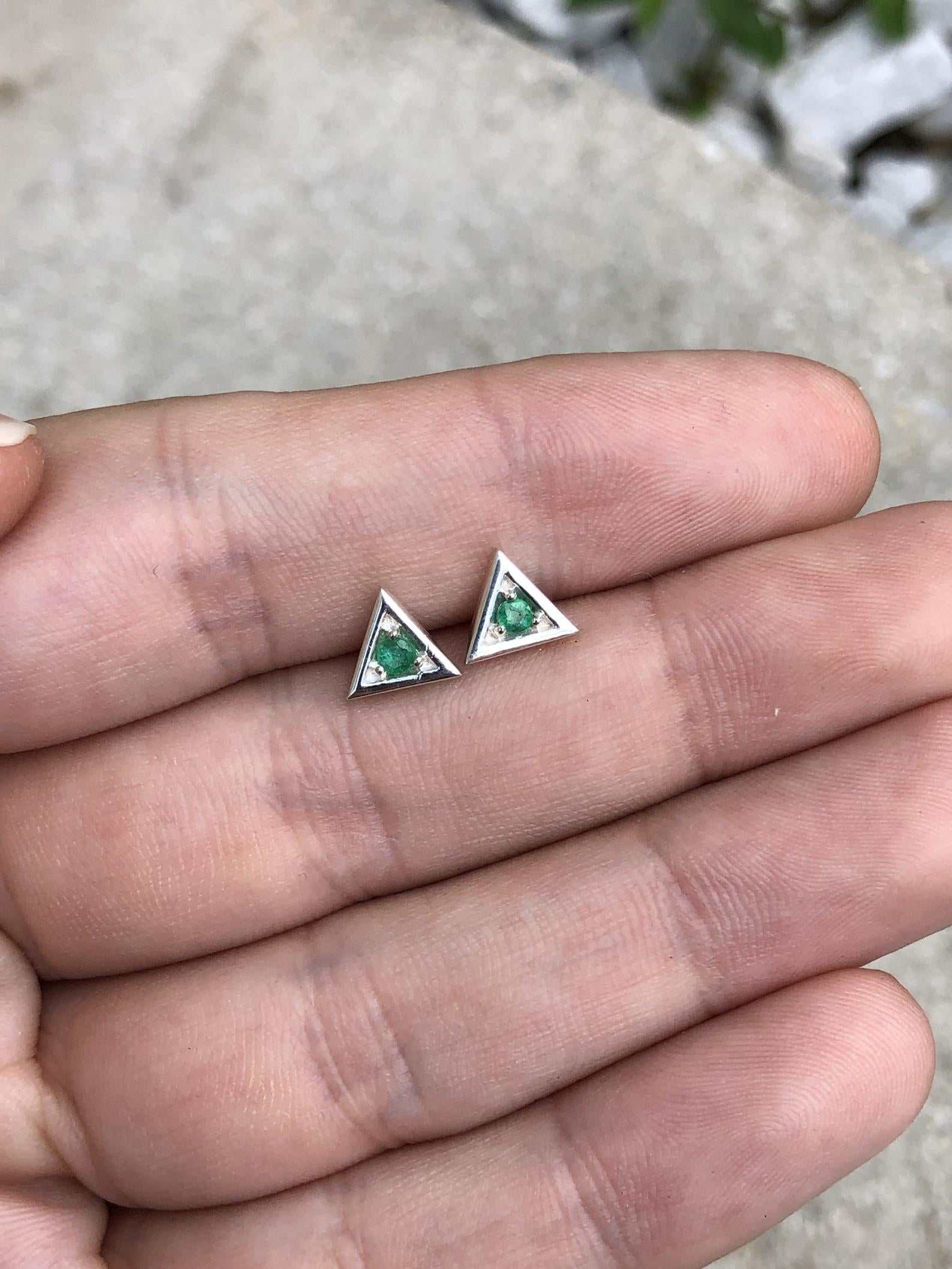 Silver earrings with round brilliant-cut emerald studs in a triangle shape, crafted by JR Colombian Emeralds.
