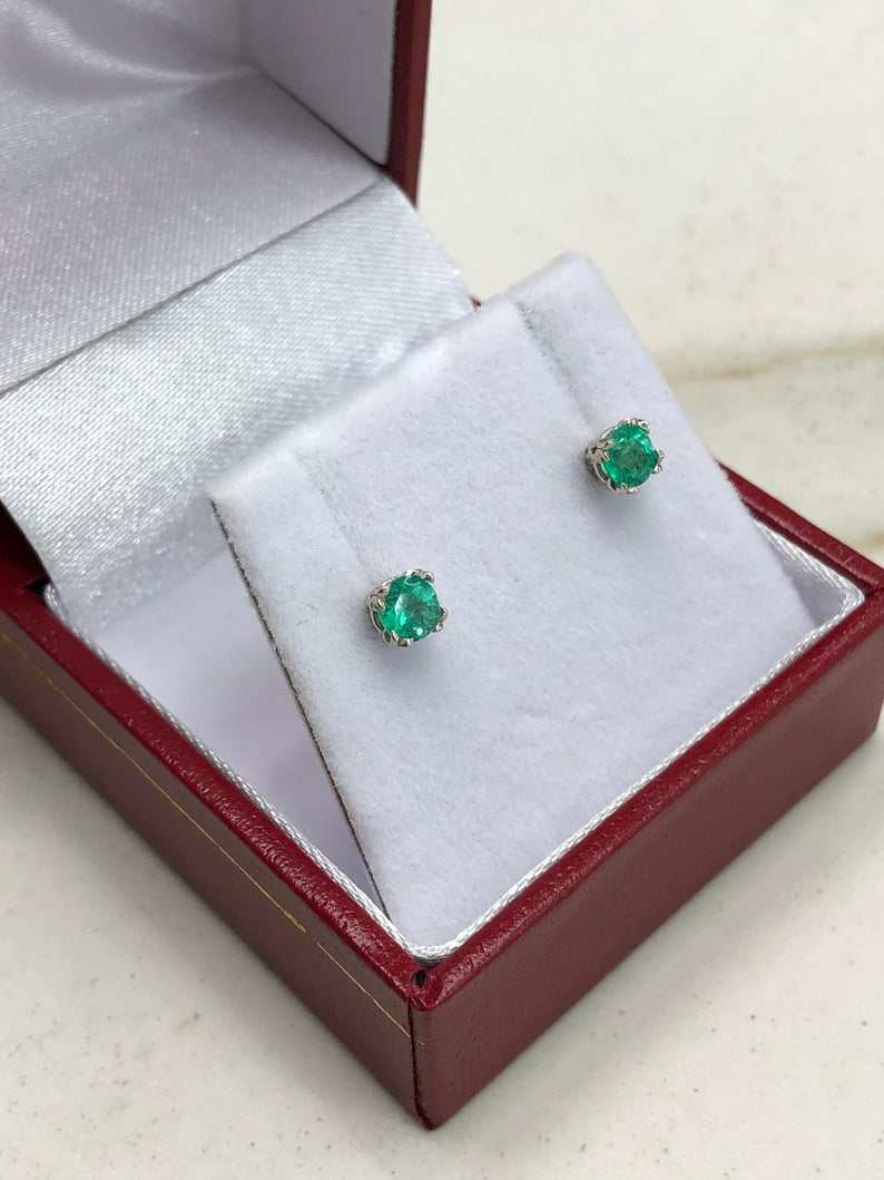 Round natural emerald double prong stud earrings in 14K yellow gold, 0.45 carats, from JR Colombian Emeralds.