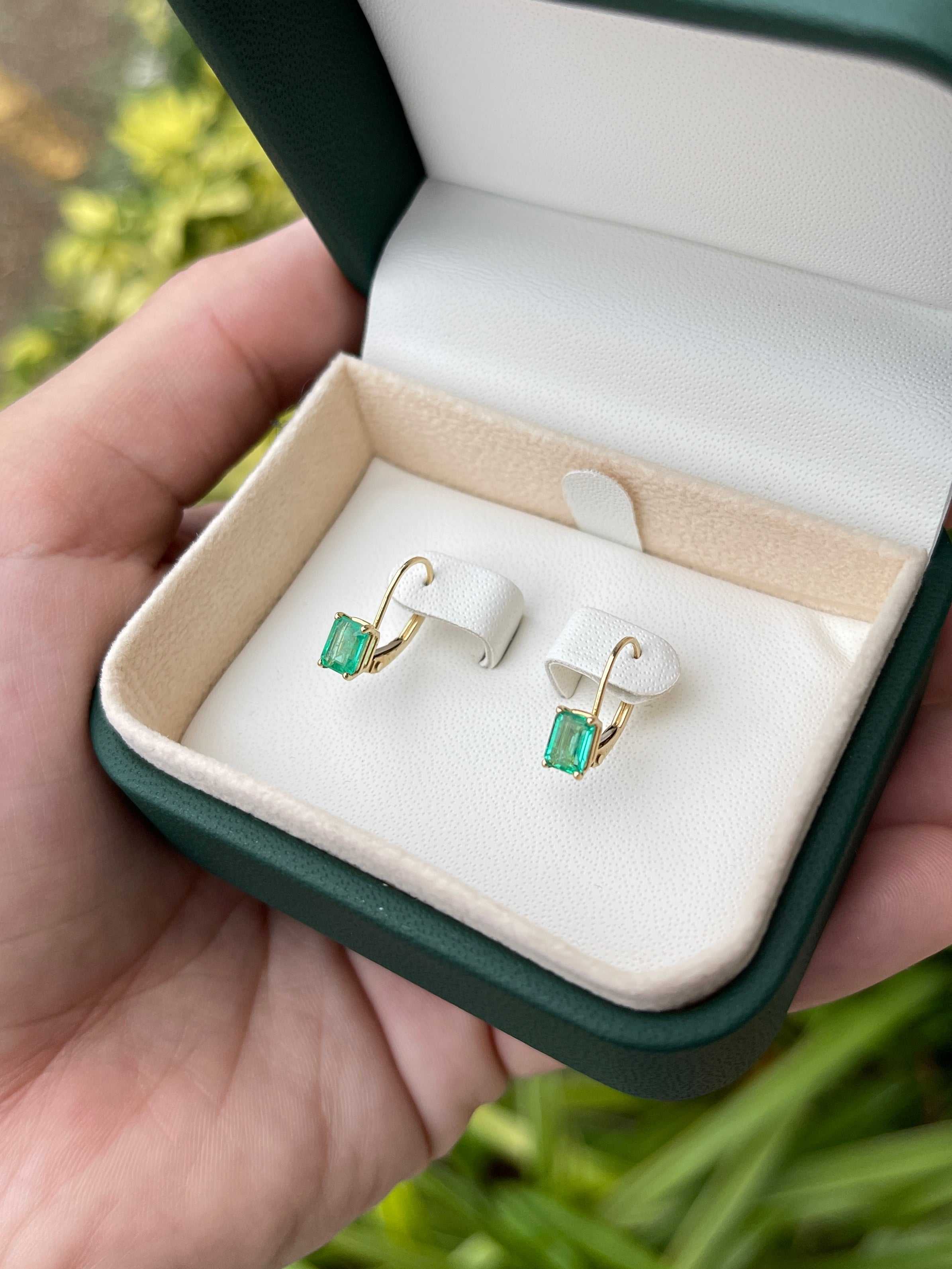 Emerald cut natural emerald earrings with prong set in 14K yellow gold, lever back style, 1.50tcw from JR Colombian Emeralds