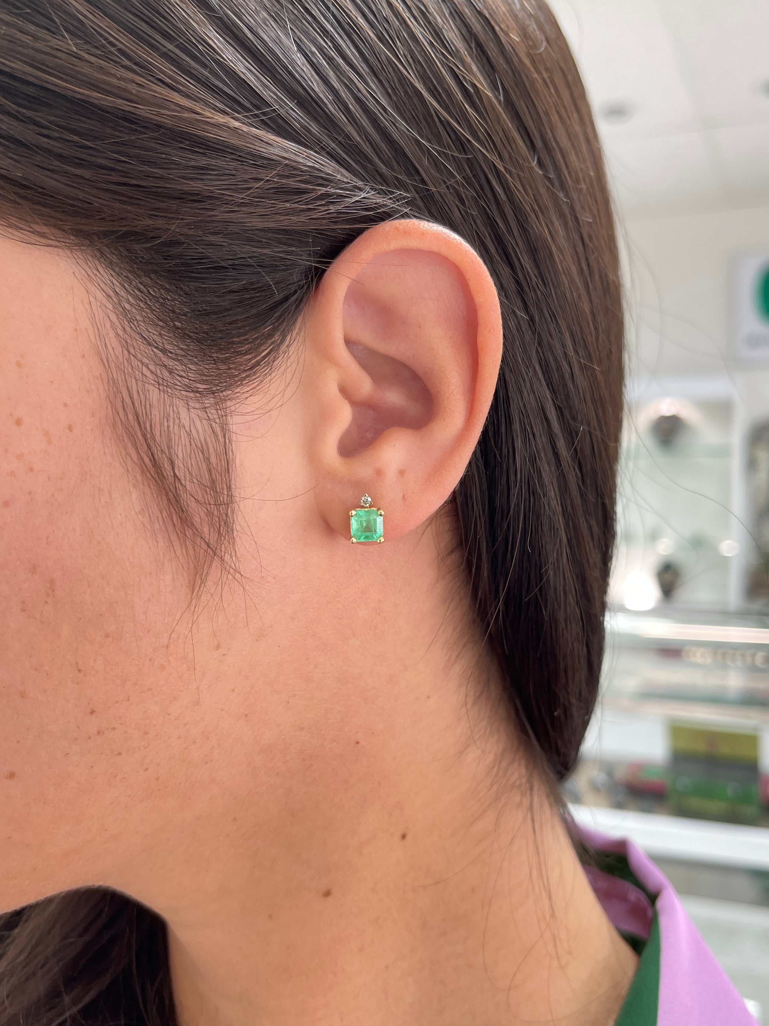 Yellow gold stud earrings with 2.07ctw natural emeralds and diamond accents from JR Colombian Emeralds.
