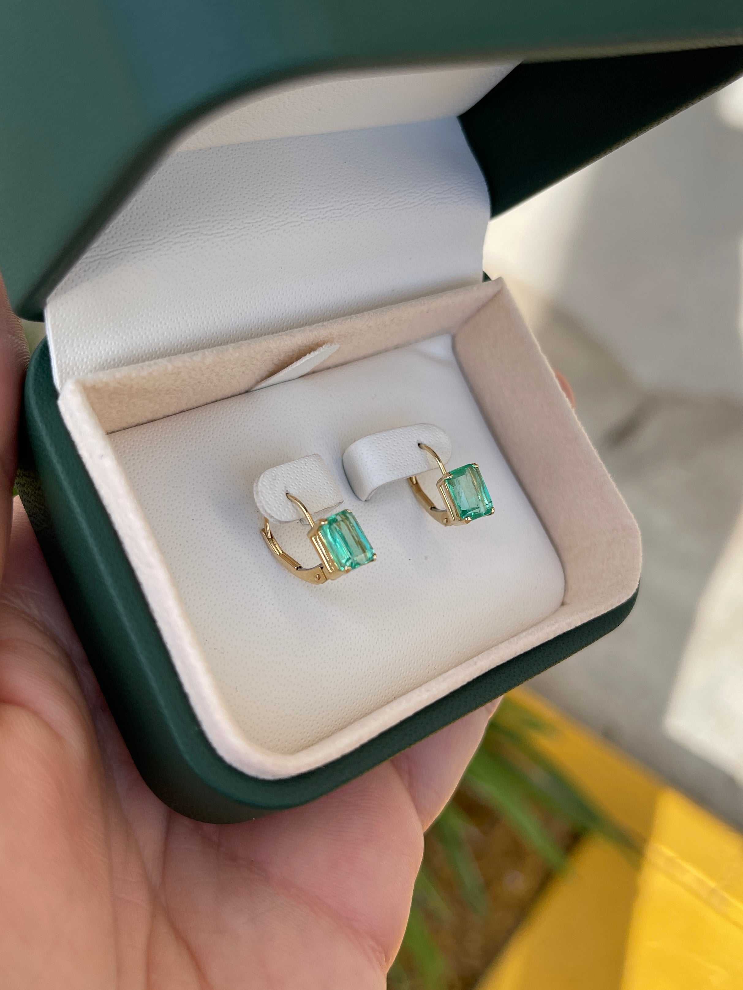 Transparent emerald cut Colombian emerald leverback gold earrings, 14K gold with 2.41tcw real Colombian emeralds.