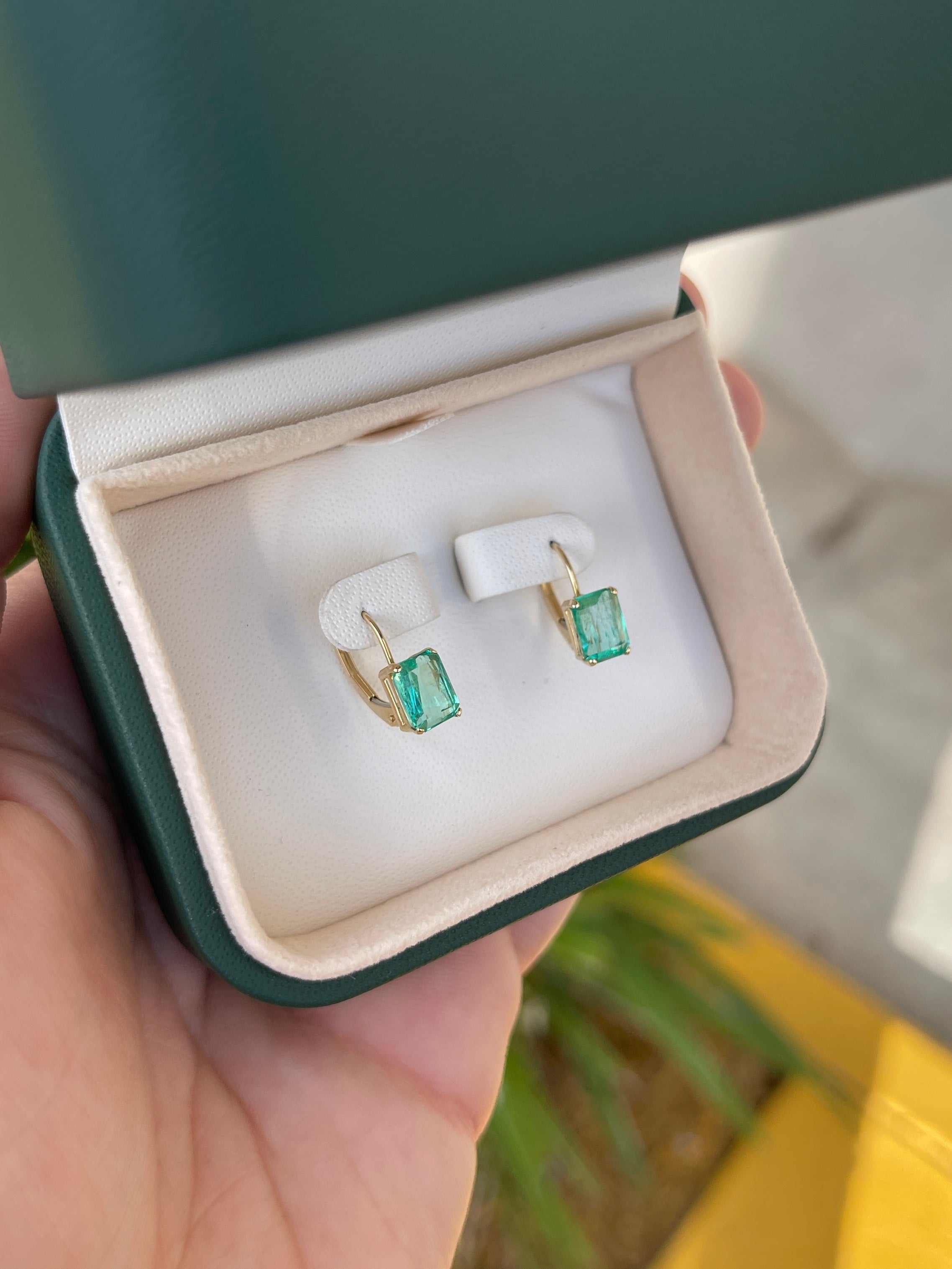 Transparent emerald cut Colombian emerald earrings with 14K gold leverbacks, totaling 2.41tcw, by JR Colombian Emeralds.