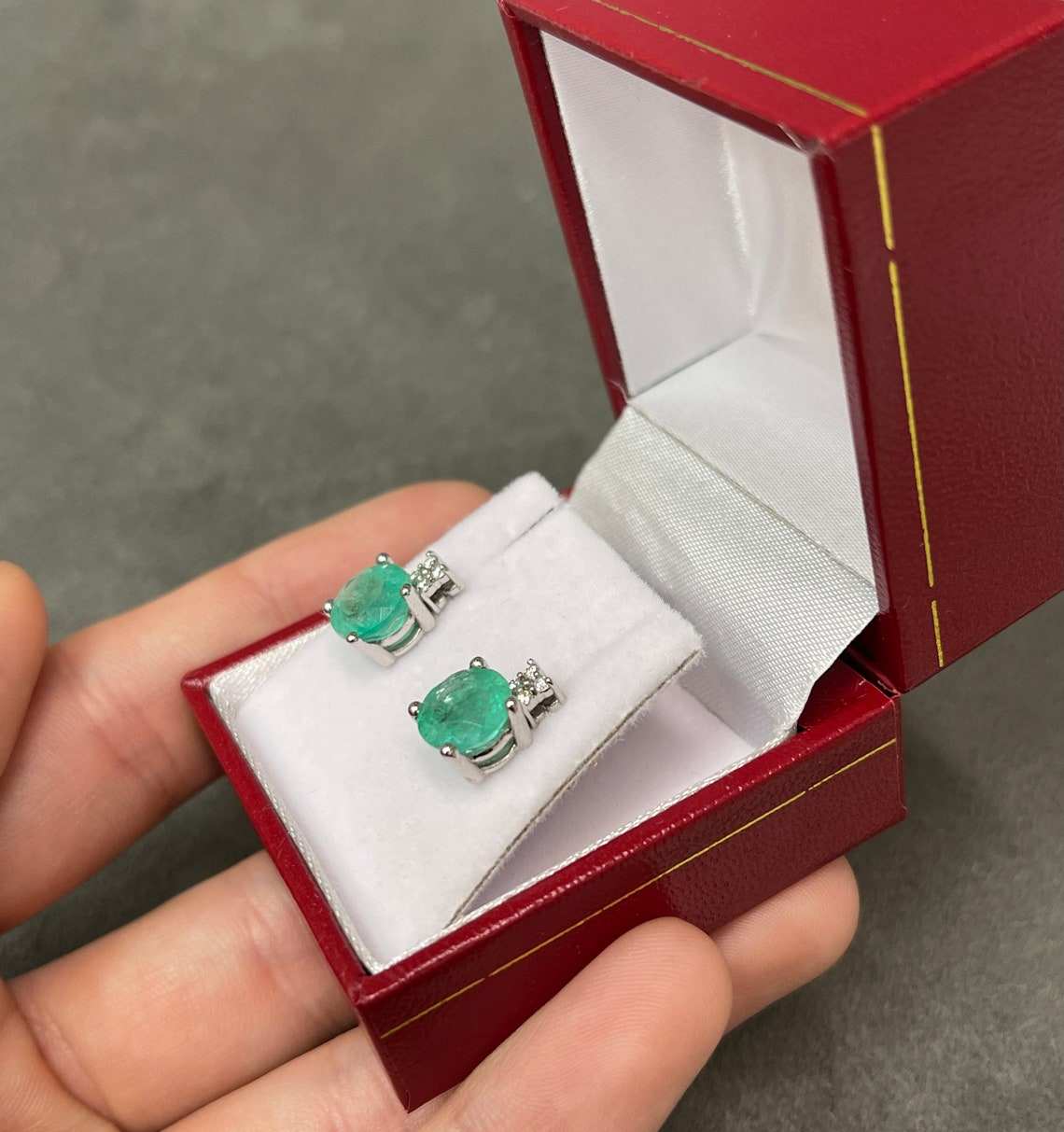 14K gold stacked stud earrings with 4.32tcw round blue-green Colombian emeralds and three diamond accents, elegant jewelry gift