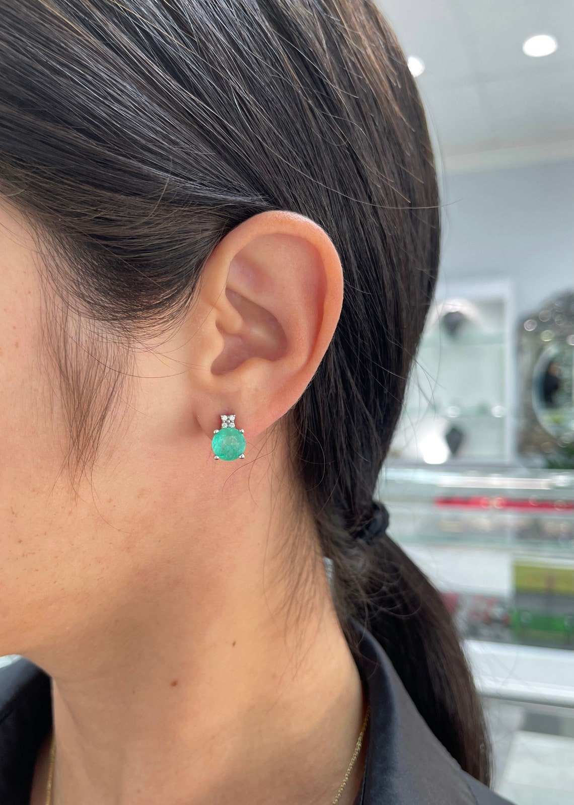 14K gold stacked stud earrings with 4.32tcw round Colombian emeralds and three diamond accents, elegant jewelry by JR Colombian Emeralds.