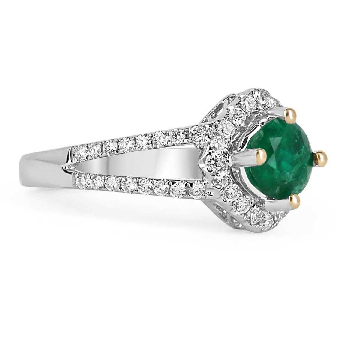 JR Colombian Emeralds engagement ring with 1.39tcw split shank design, emerald center stone, and diamond halo setting.