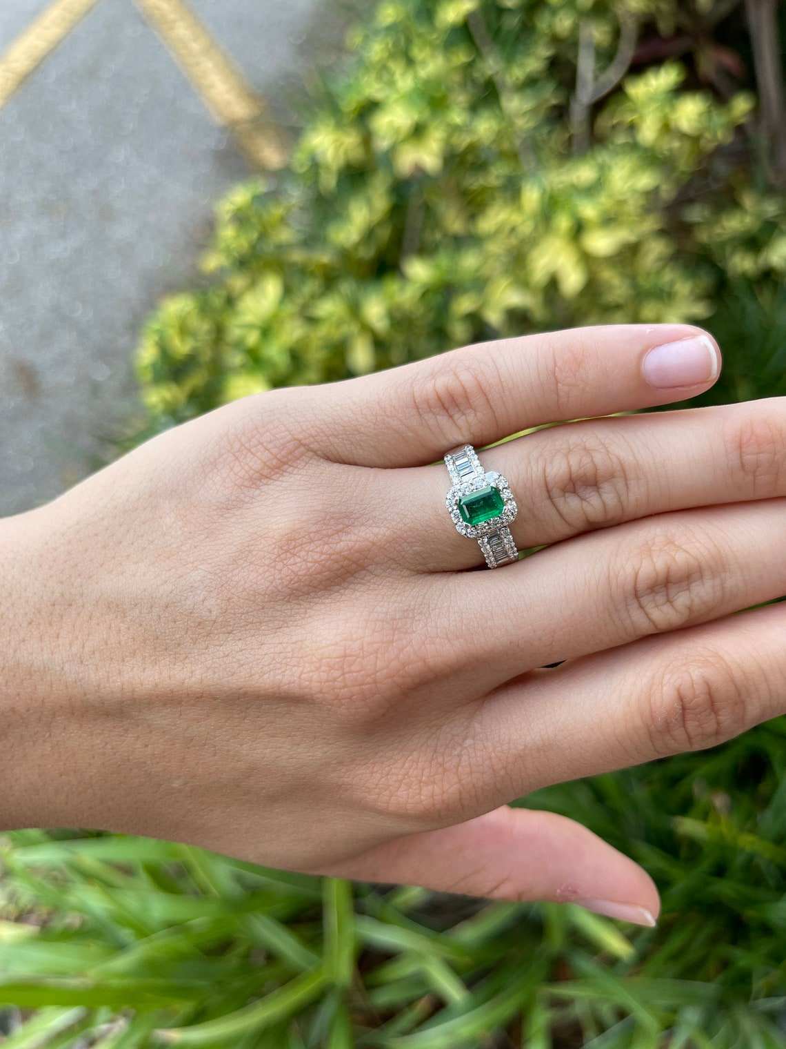 Natural green emerald and diamond engagement ring with round and baguette diamonds, 14K gold from JR Colombian Emeralds.