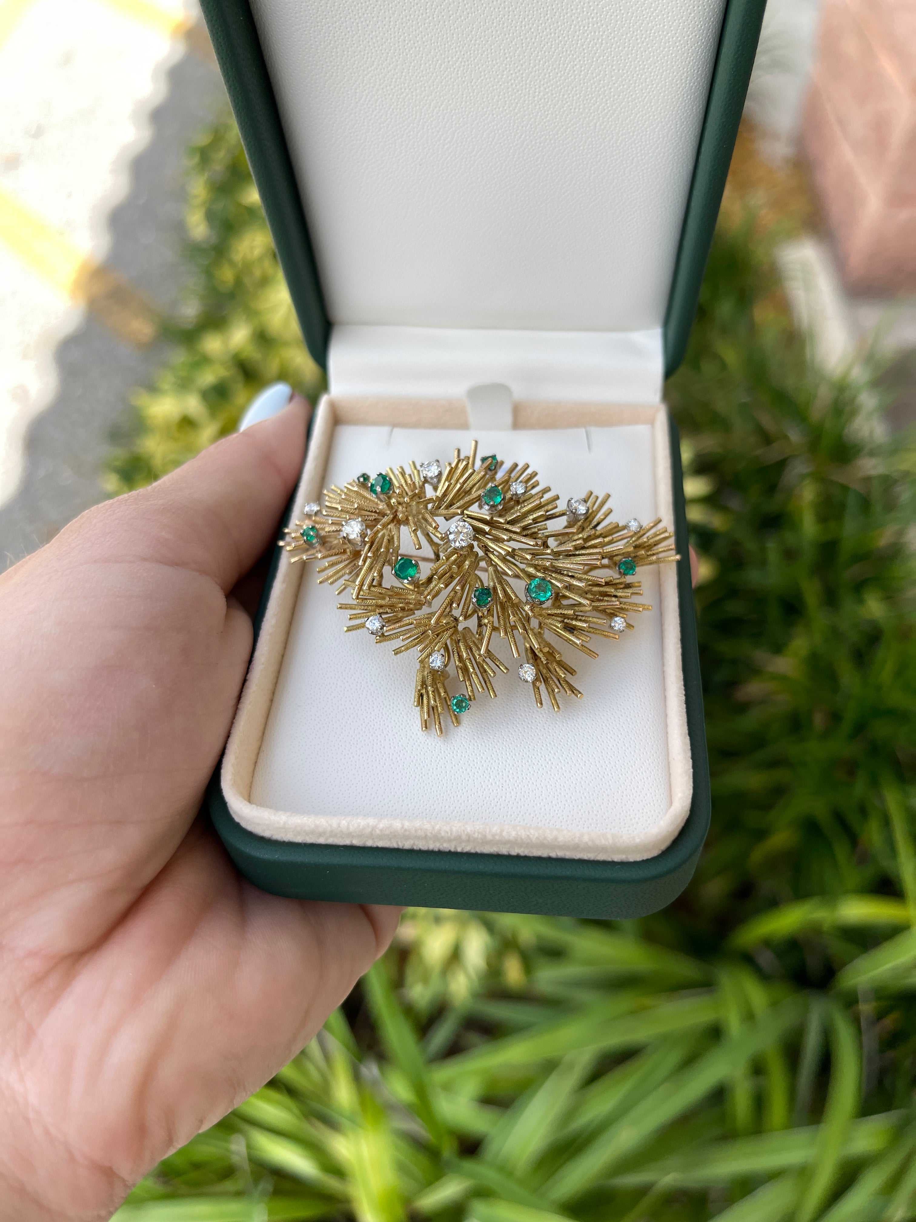 Colombian emerald and diamond gold sea urchin brooch, 18K, featuring vibrant green emeralds and sparkling diamonds.