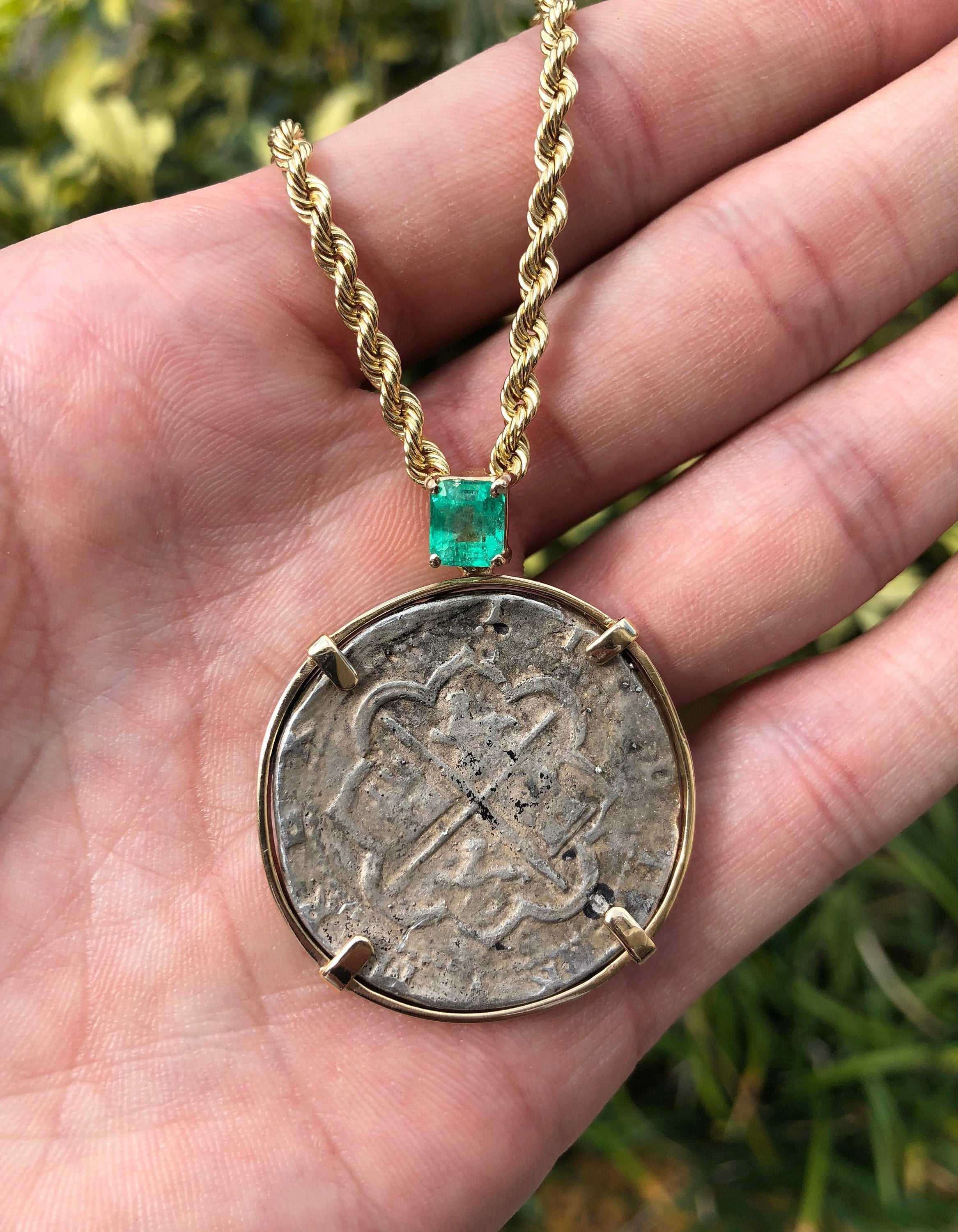 Unisex 1.10 carat Shipwreck Atocha medallion pendant with yellow gold and silver, featuring an emerald-cut design.