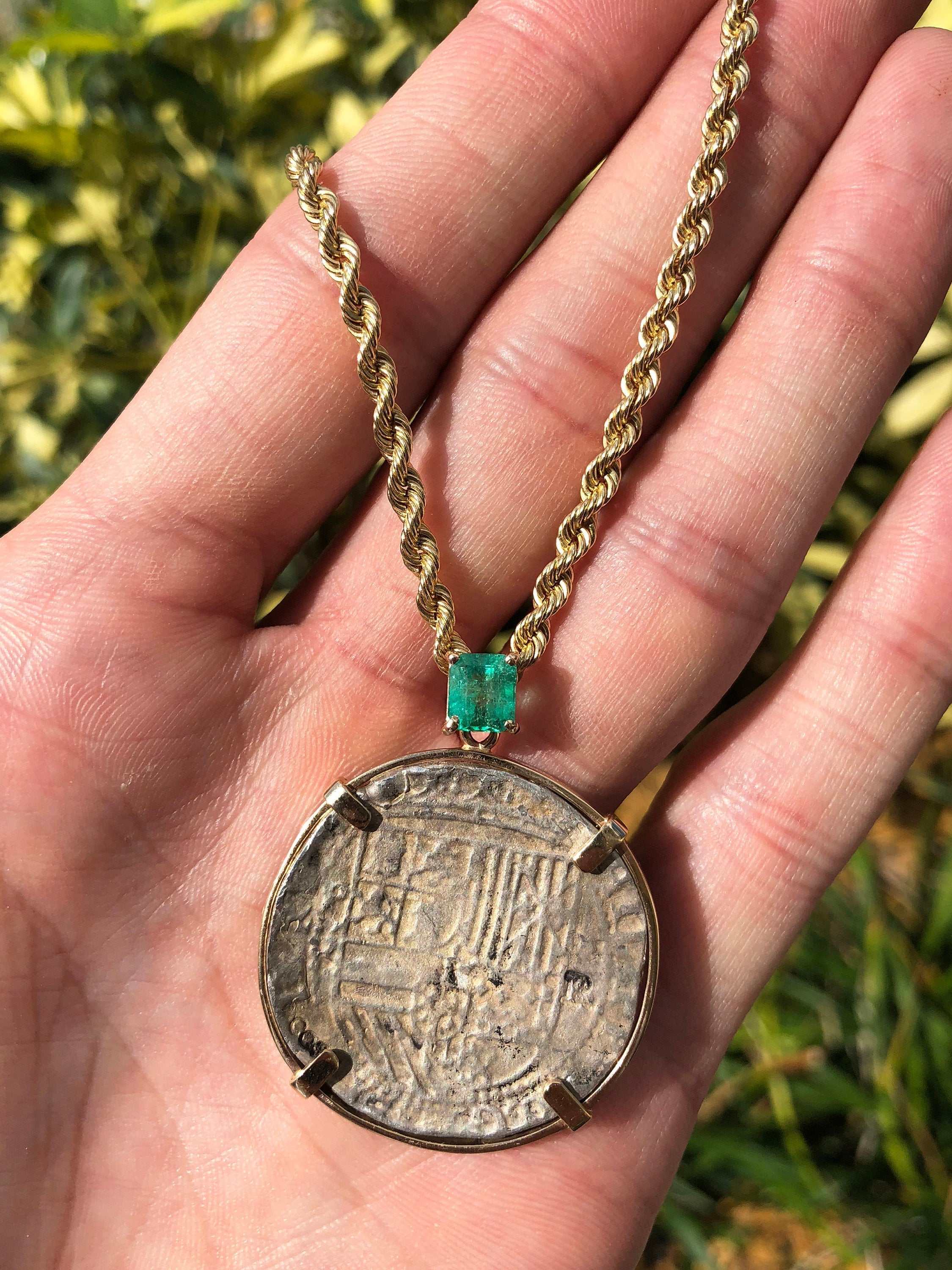 Unisex Shipwreck Atocha medallion pendant with 1.10 carat emerald-cut gemstone, yellow gold and silver 14K jewelry.