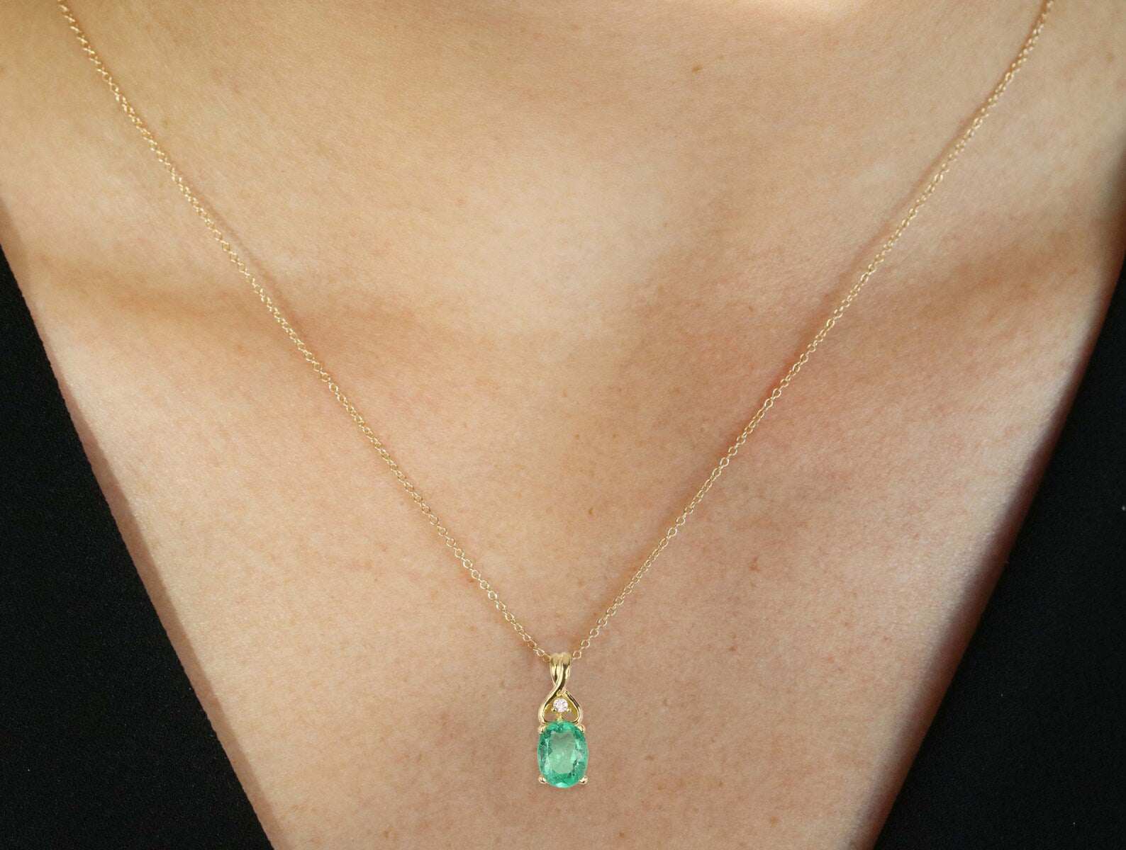 1.43tcw Natural Rich Green Emerald Oval Accented Round Diamond Pendant 14K